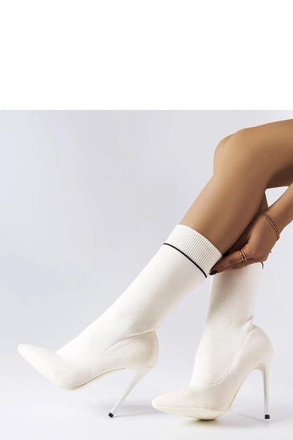 Elegant Pelletier white sock boots with stiletto heel and sleek design, perfect for modern style.