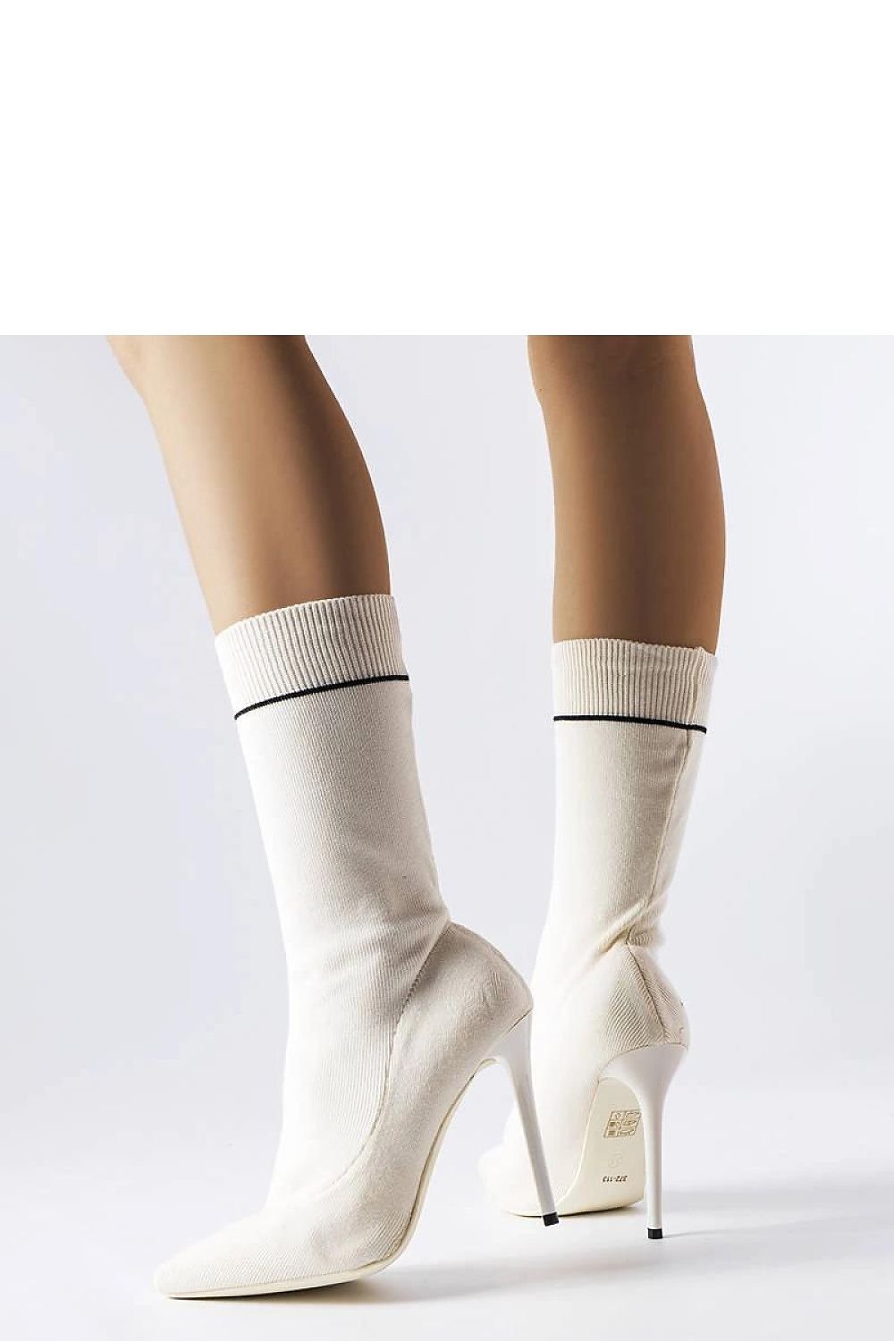 Elegant white high heel sock boots with a sleek design, featuring a pointed toe and ankle-high shaft, perfect for stylish occasions.