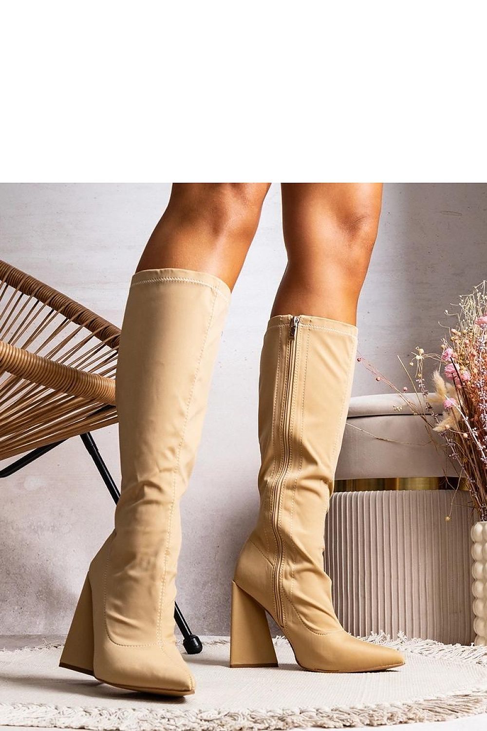 Beige high heel ankle boots with pointed toe, perfect for fall and winter, showcasing elegant style and comfort.