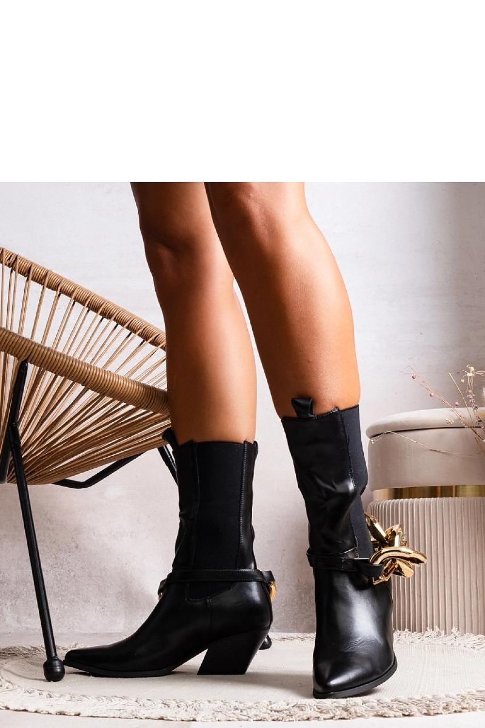 Black high heel cowboy ankle boots with chains and pointed toe, stylish design for fall/winter fashion.