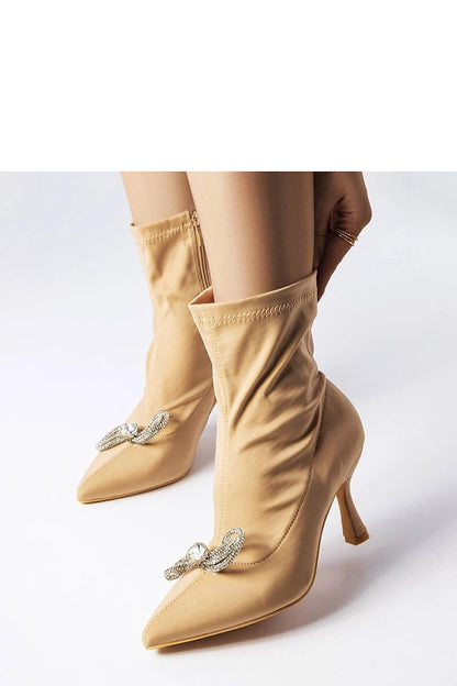 Elegant beige high-heeled ankle boots with rhinestone bow from the Mars collection, ideal for autumn and winter styles.