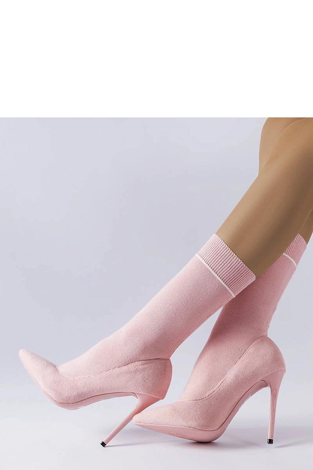 Chic pink high-heeled sock boots with pointed toes and ankle coverage, perfect for a stylish, modern look.