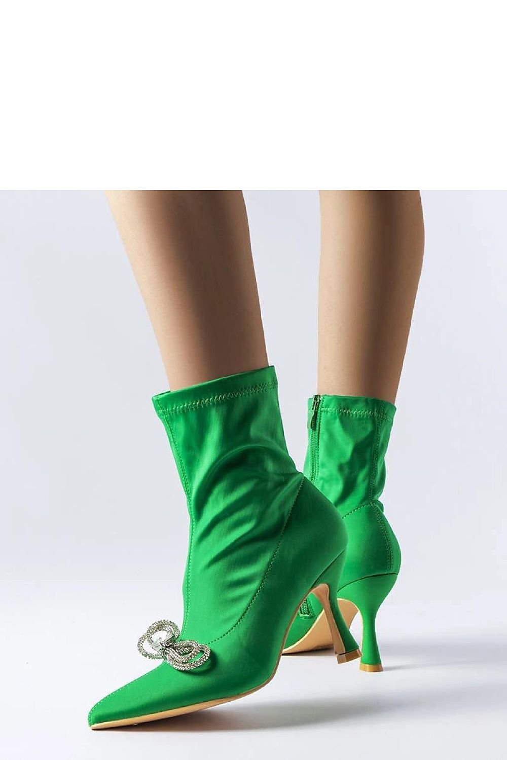 Green high heel ankle boots with rhinestone bow, featuring a sleek design and side zipper, perfect for stylish autumn/winter outfits.