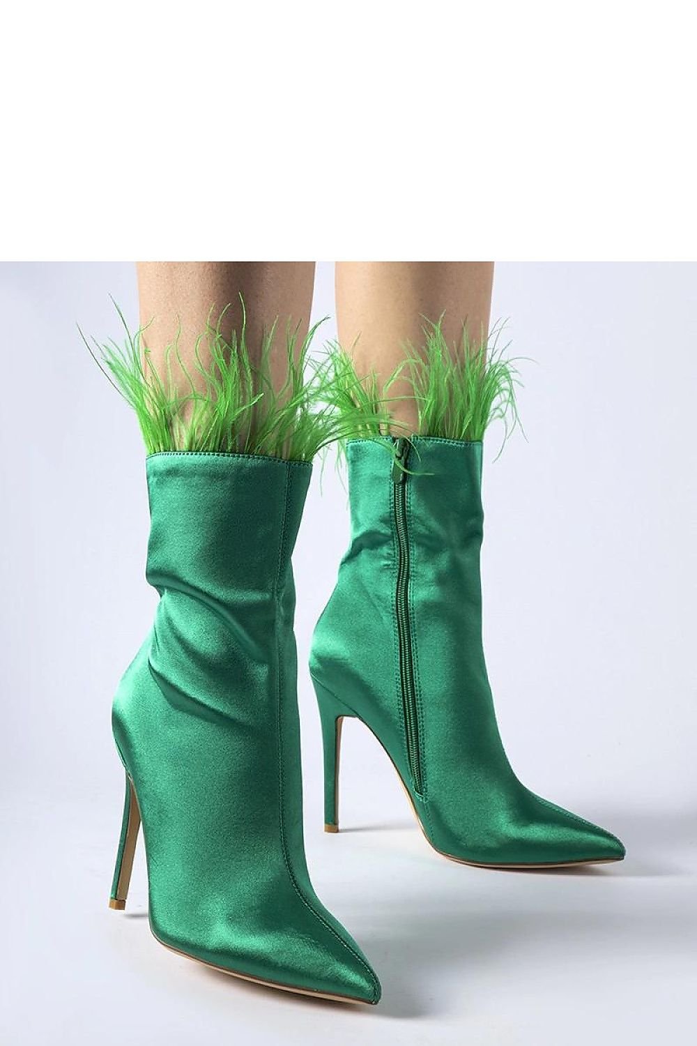 Green high-heeled ankle boots with feather trim and side zipper, stylish and comfortable for women on the go.