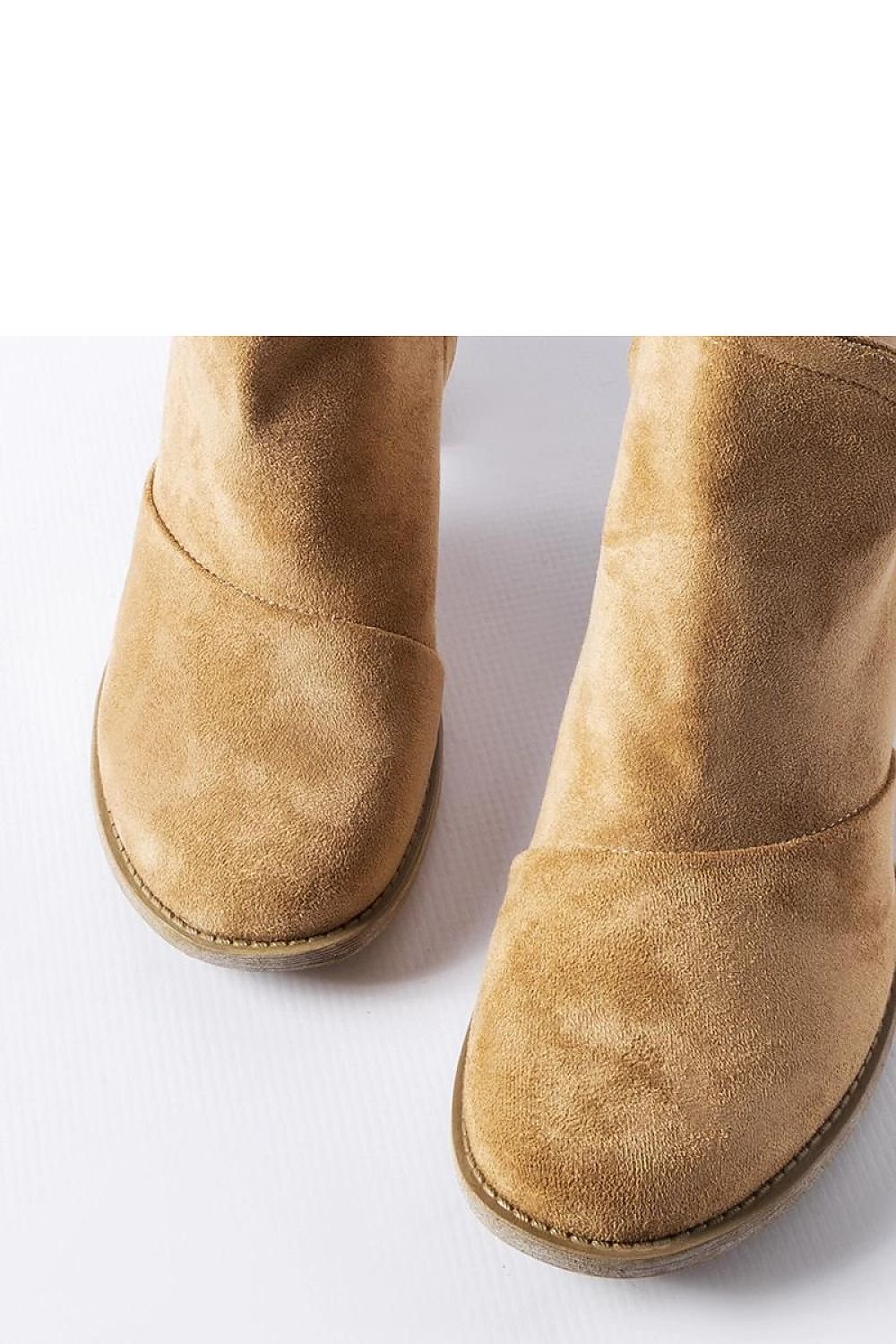 Beige suede ankle boots with a sleek design, perfect for the fall-winter season