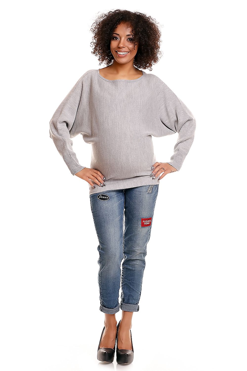 Model wearing grey oversized maternity pullover with kimono sleeves, peek-a-boo shoulder, and comfortable casual fit.