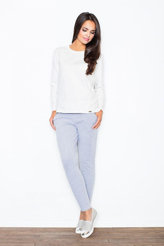 Woman wearing light grey Figl model 43914 joggers, made of soft cotton with a relaxed fit. Perfect for spring. Available in multiple sizes.