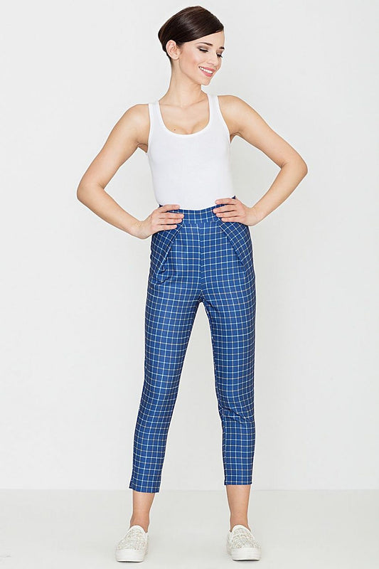 Woman wearing Lenitif Női nadrág model 114285, retro checkered pants suitable for business meetings and everyday wear.