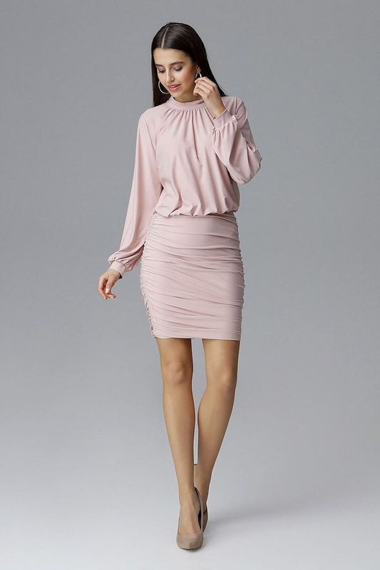 Woman in pink Figl Model 126005 evening dress with long sleeves and side gathers, perfect for a night out; polyester blend.