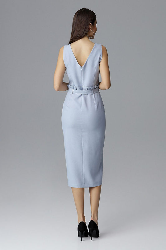 Back view of elegant sleeveless dress with belt and sweet neckline in light blue. Model wearing heels.