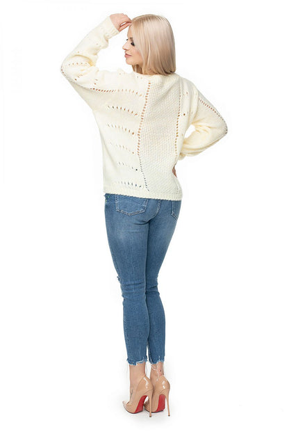 Model wearing Pulóver model 131600 PeeKaBoo in white with open-knit design, showcasing back detail.