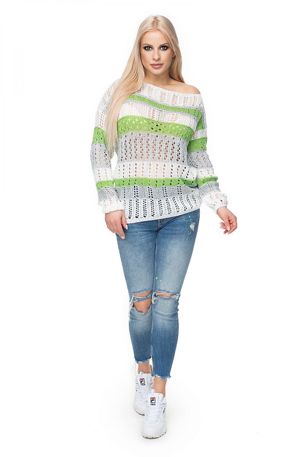 Model wearing Pulóver model 131612 PeeKaBoo, a short, colorful striped sweater with openwork knit, made of soft acrylic blend.