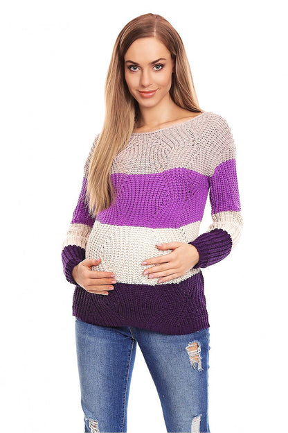 Woman wearing colorful striped maternity sweater with long sleeves, showcasing the unique texture and design of the PeeKaBoo model 132018.