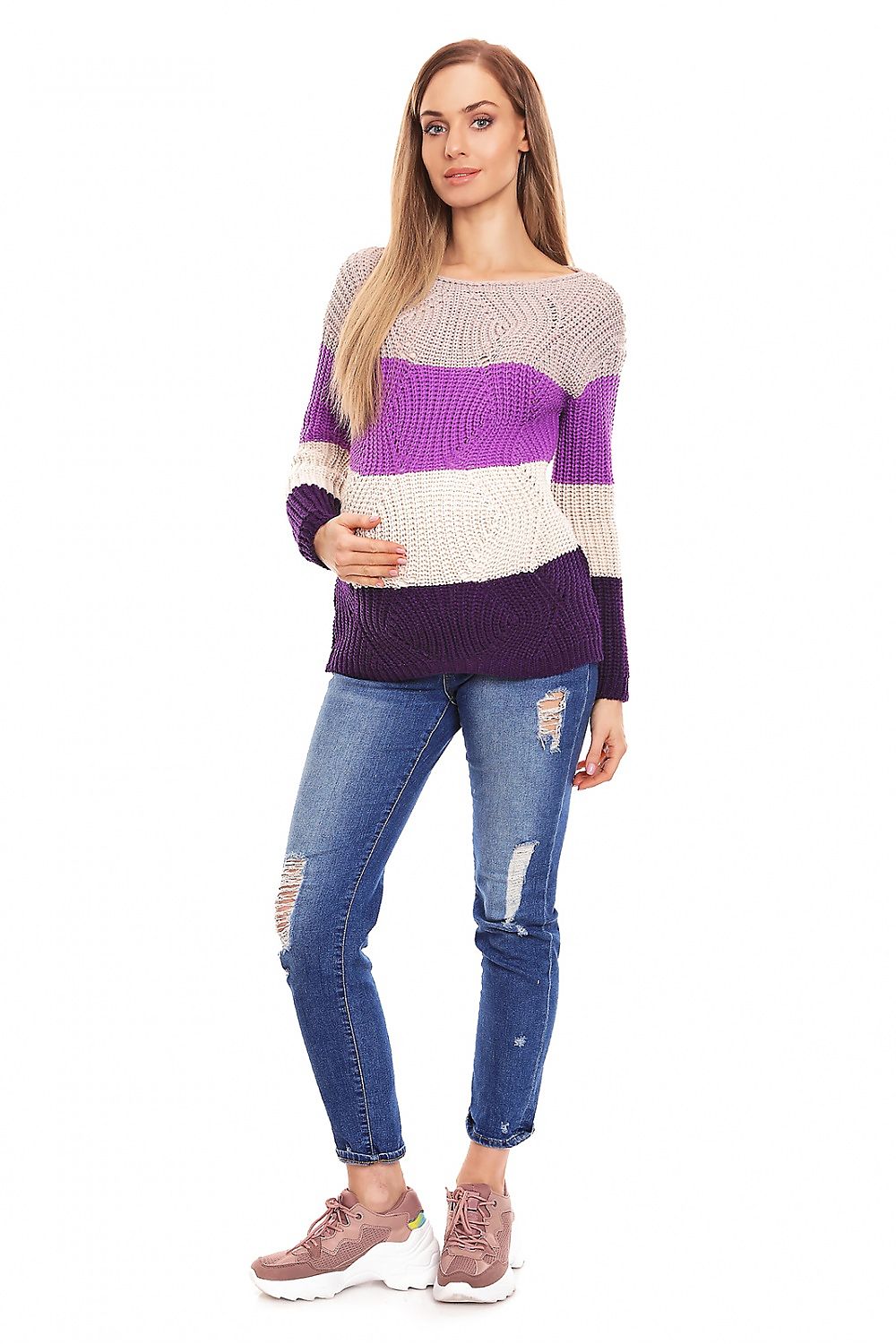 Colorful striped maternity sweater with dense knit, long sleeves, and sheer front detail. 100% acrylic. Model wearing ripped jeans.