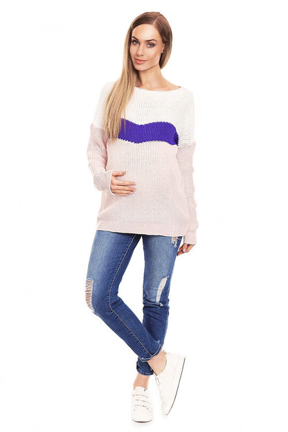 Pregnant woman wearing long-sleeve maternity sweater with boat neckline, model 132024 PeeKaBoo, standing in casual jeans and sneakers.