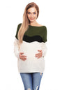 Model wearing a long sleeve maternity sweater in green and white with boat neckline, PeeKaBoo 132024, stylish and comfortable.