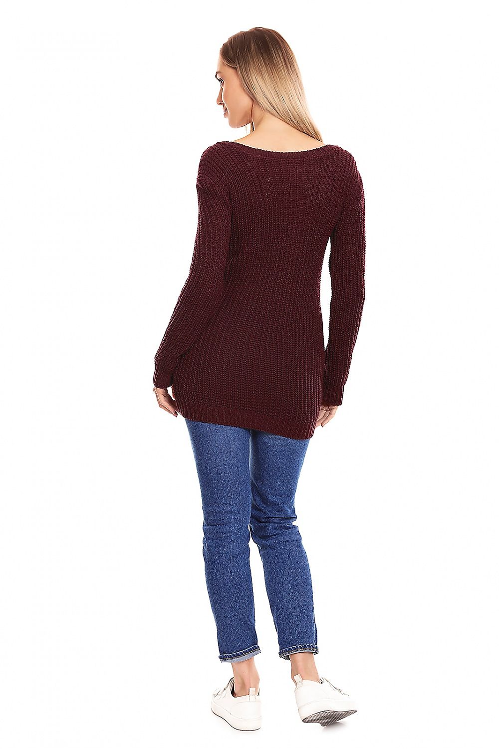 Woman wearing burgundy maternity knit pullover with decorative braid, boat neckline, paired with jeans and sneakers, back view.