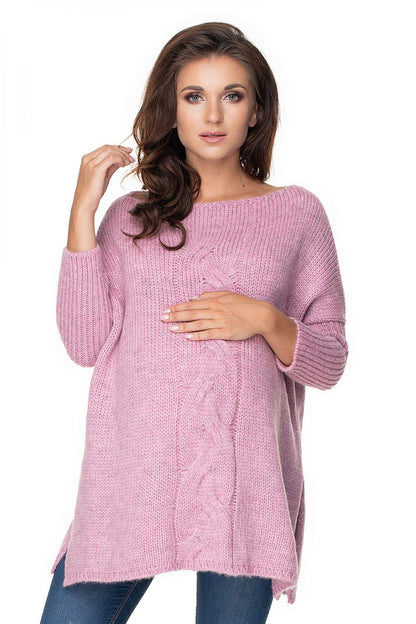 Pink maternity sweater model 135981 by PeeKaBoo with side slit and loose fit, worn by woman.