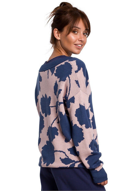 Elegant floral knit sweater with V-neck, shown in blue and beige pattern. Perfect for a stylish, lightweight look.