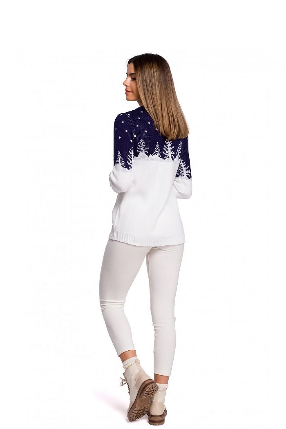 Woman wearing a stylish Christmas sweater model 150209 with tree motif, limited edition, 100% acrylic.