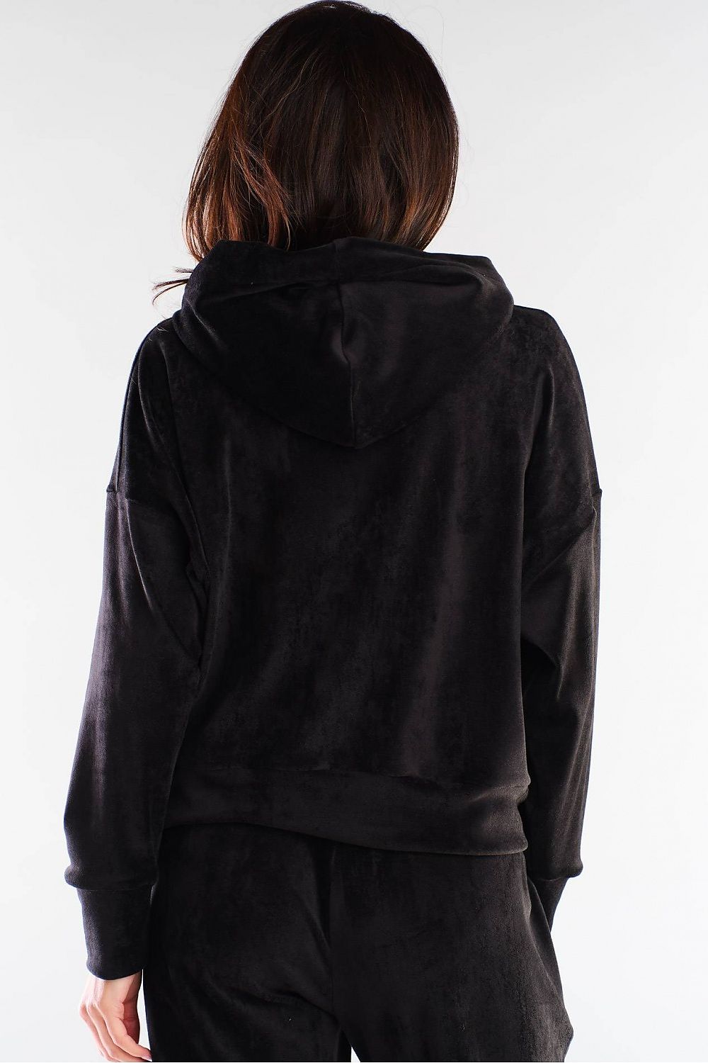 Back view of black velour hoodie, relaxed fit, designed in Poland by Awama.