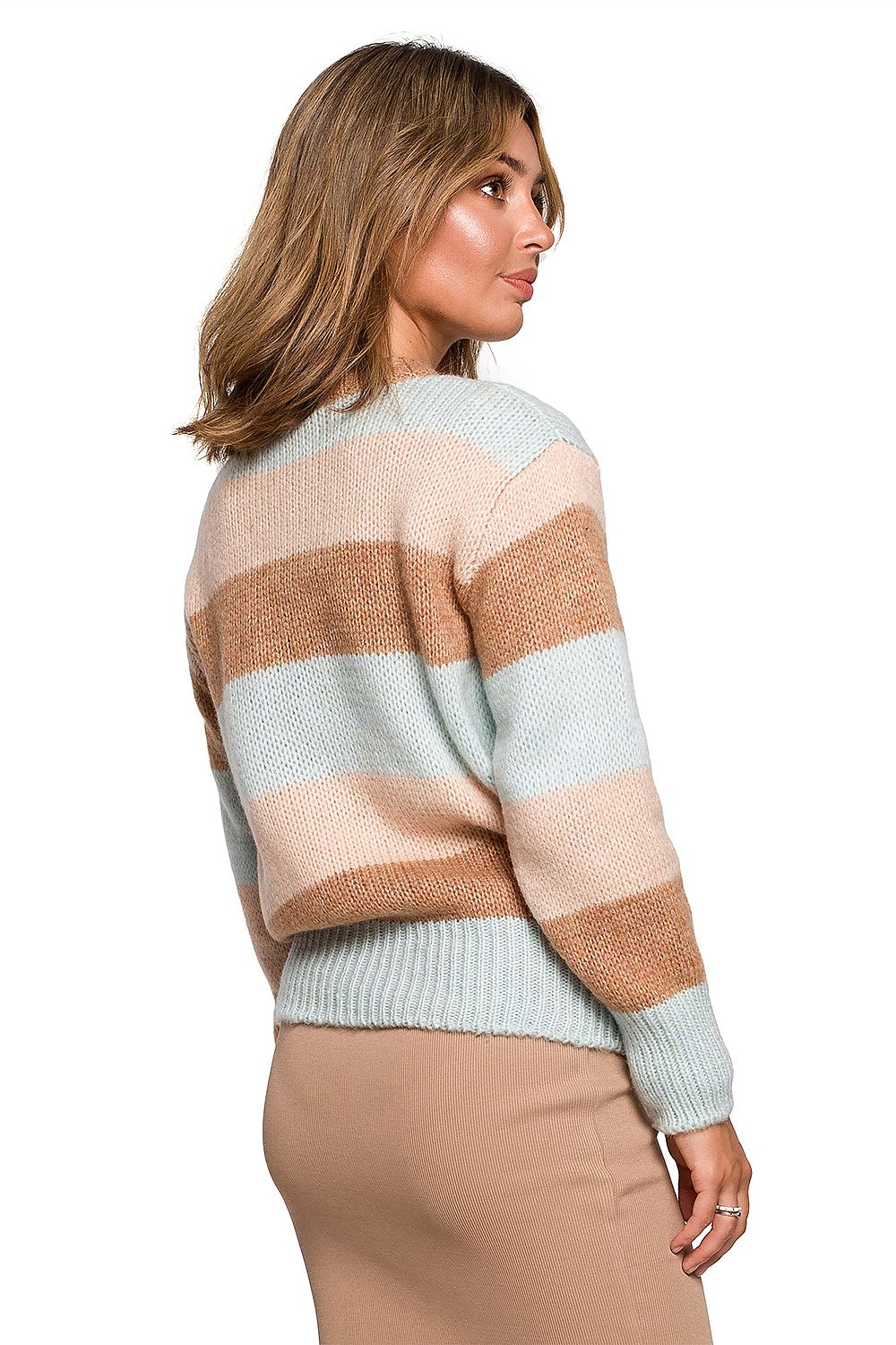 Woman wearing a striped knit pullover in pastel colors, perfect for autumn and winter, showcasing back design.