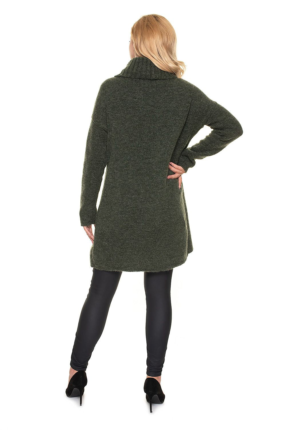 Woman wearing a soft, furry green maternity pullover with an asymmetrical cut and loose turtleneck, ideal for pregnancy and nursing.