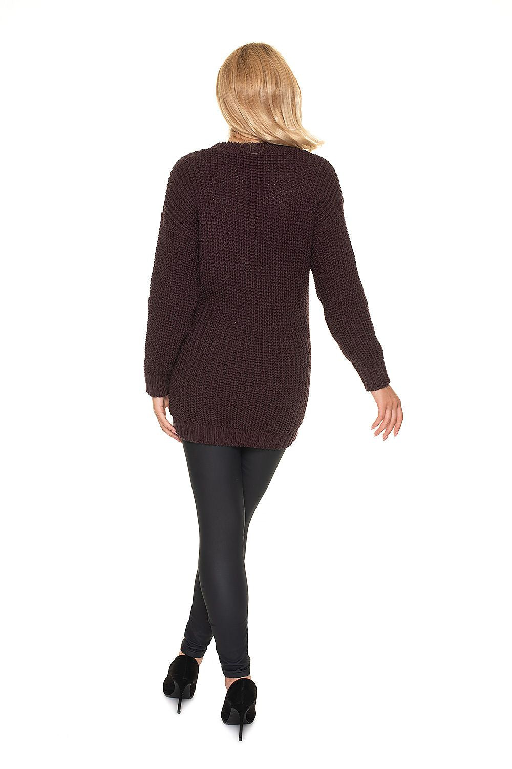 Back view of a woman wearing a long knitted maternity sweater with a cowl neck and braided pattern, perfect for cozy comfort.