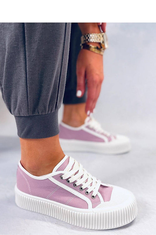 Stylish pink platform sneakers with white laces, featuring a 4 cm high sole, perfect for a trendy and comfortable look.