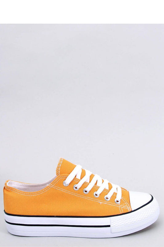 Classic women's high-soled sneakers in yellow canvas with white laces and black trim, model 178740 by Inello.